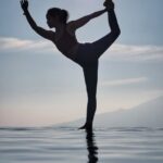 6. Standing Bow Pulling Pose (Dandayamana Dhanurasana)