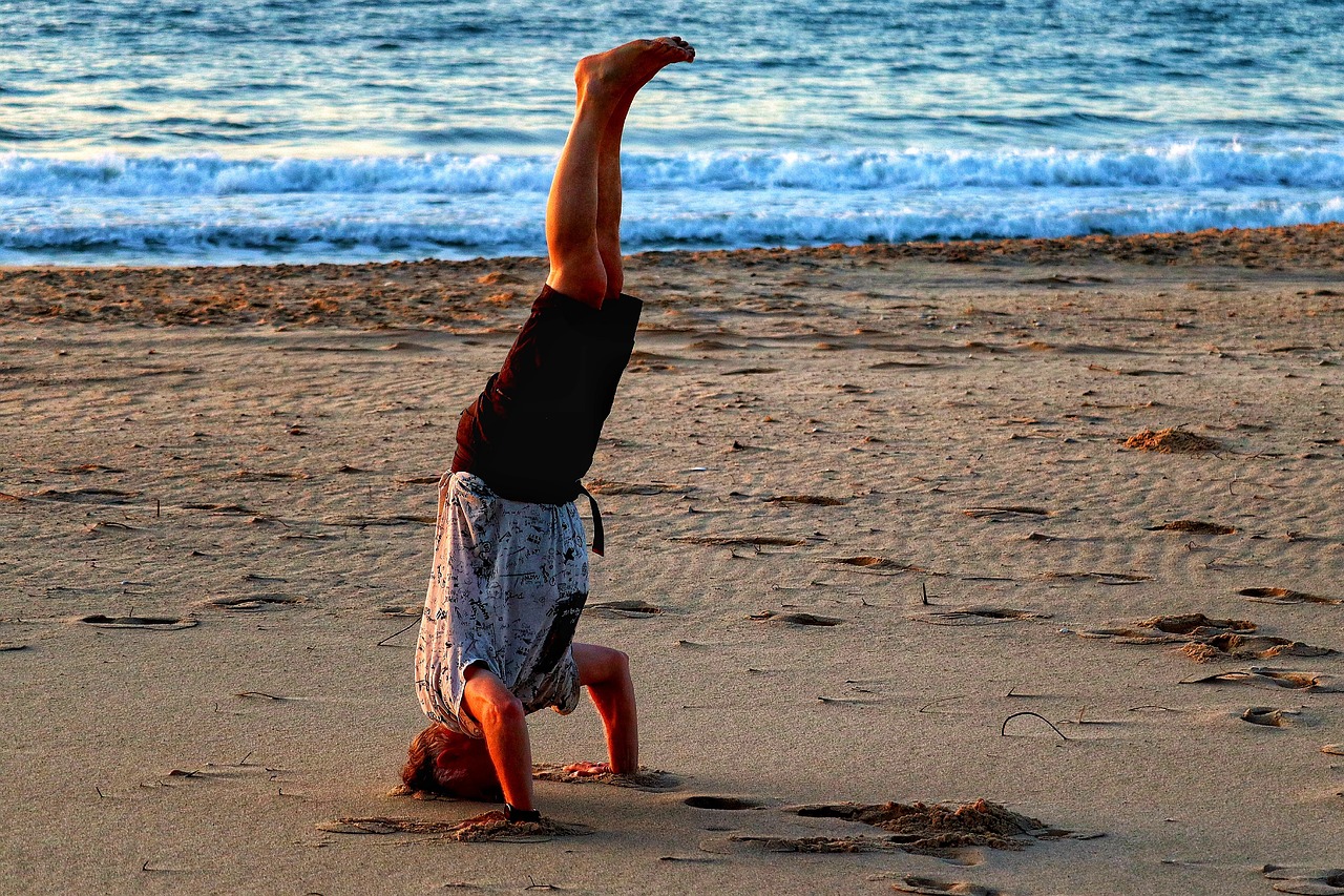 Beach, yoga, meditation, nature, headstand, waves, sand, sunrise