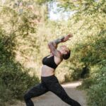 Short lunge, right foot back, hands on the wall