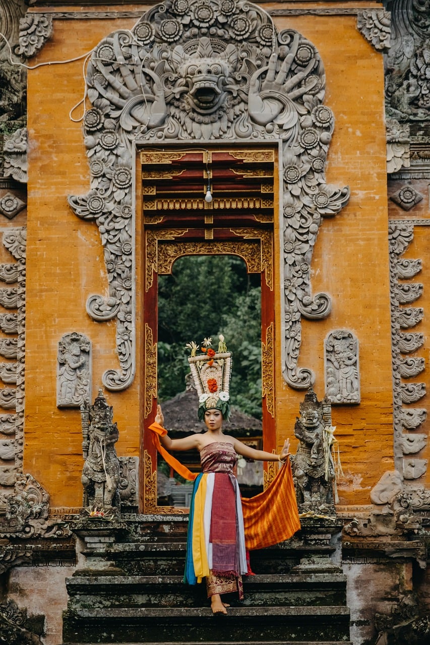 Balinese temple, traditional attire, dancer, architecture, statues, history, decoration, cultural heritage, indonesia, colorful costume, performance, temples of bali, bali culture, traditional dance,