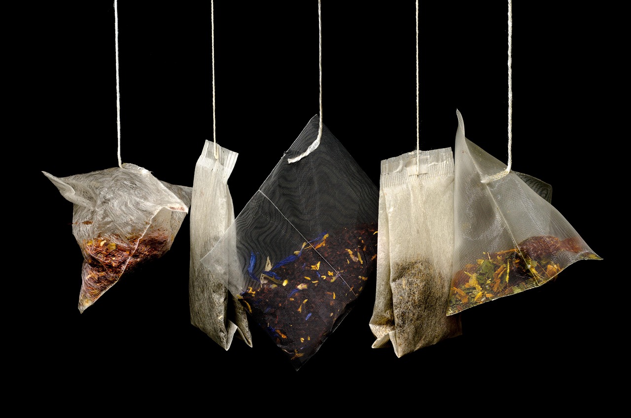 Tea, teabags, herbs, herbal, herbal tea, healthy, breakfast, black tea, strings, hang, black background